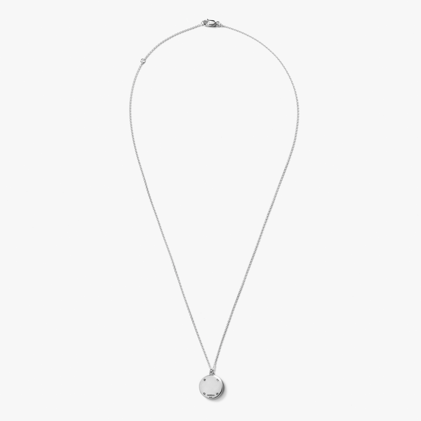 The Shinola Heirloom Turquoise Pendant Necklace features a delicate round turquoise pendant on a sterling silver chain, displayed against a plain white background. A refined piece of engraved jewelry perfect for any occasion.