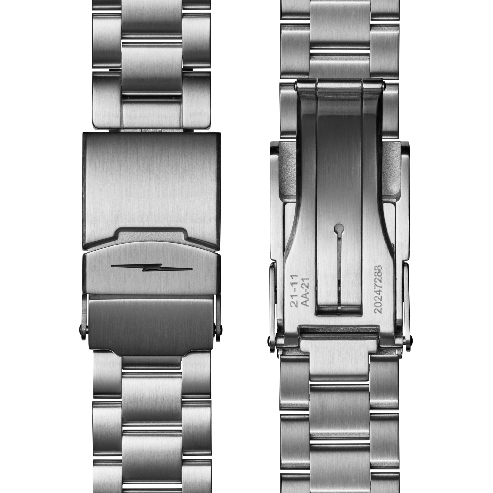 Two stainless steel clasps from the Shinola Monster GMT Automatic Watch - Whiskey are shown: the left features a lightning bolt logo, while the right displays the inner locking mechanism with engraved numbers.