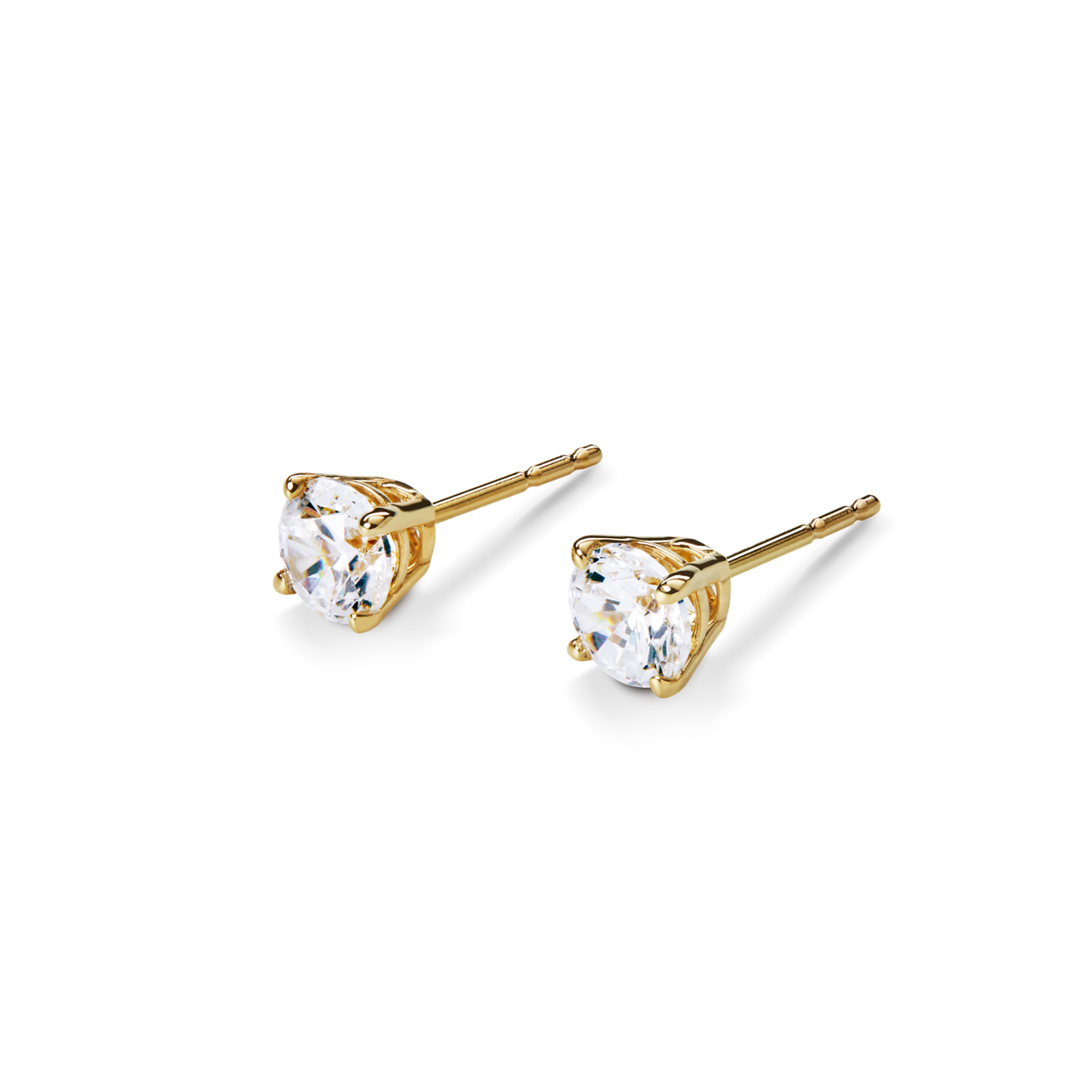 Shinola's 1 Carat Round Diamond Studs in yellow gold feature classic three-prong settings, showcased against a plain white background.