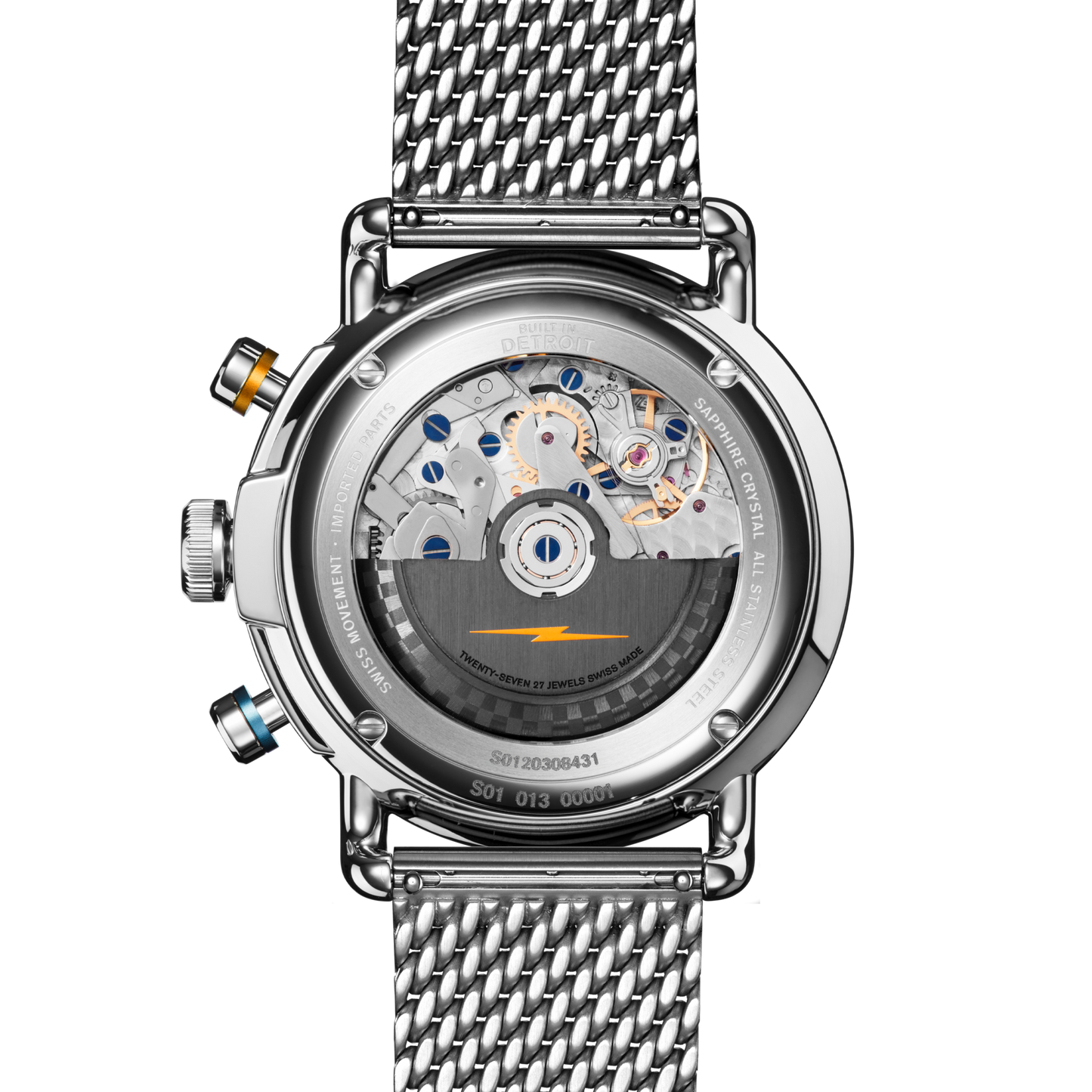 The image shows the back of the Shinola Canfield Speedway Open Road Automatic Chronograph Watch - Blue, featuring a mesh metal strap and displaying its intricate Swiss-made movement with visible gears and accents through a transparent case back.