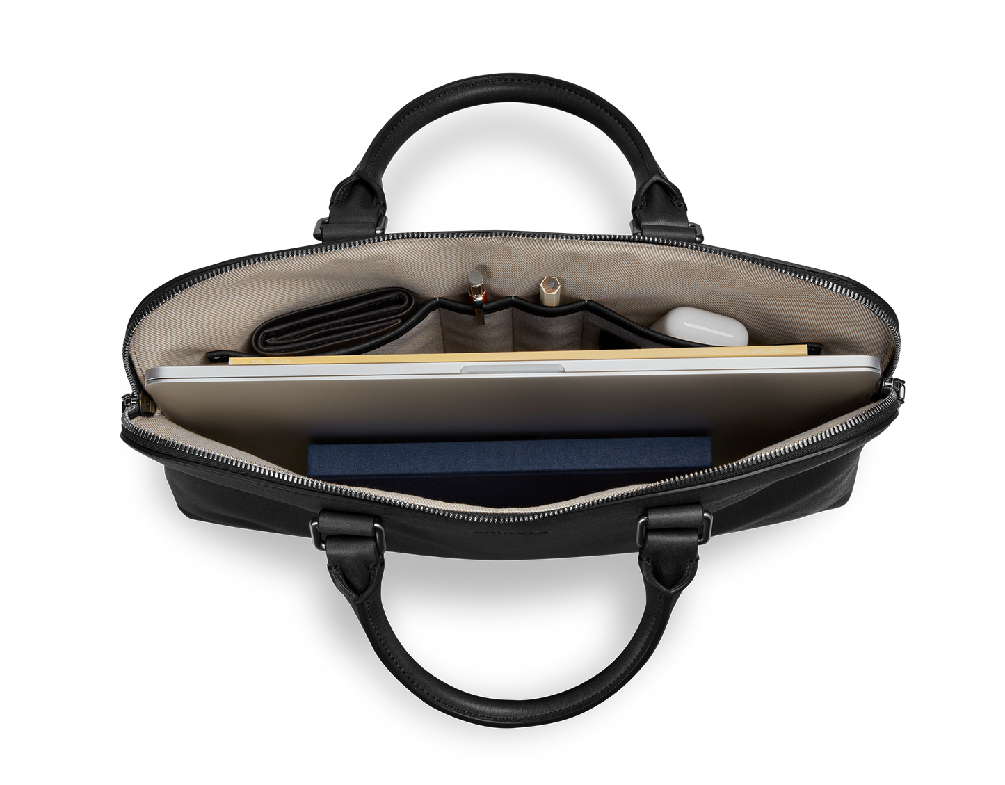 Top view of the Shinola Portfolio Briefcase - Black, open to show organized contents—laptop, notebook, wallet, pens, and a white wireless earbud case in beige-fabric-lined compartments.