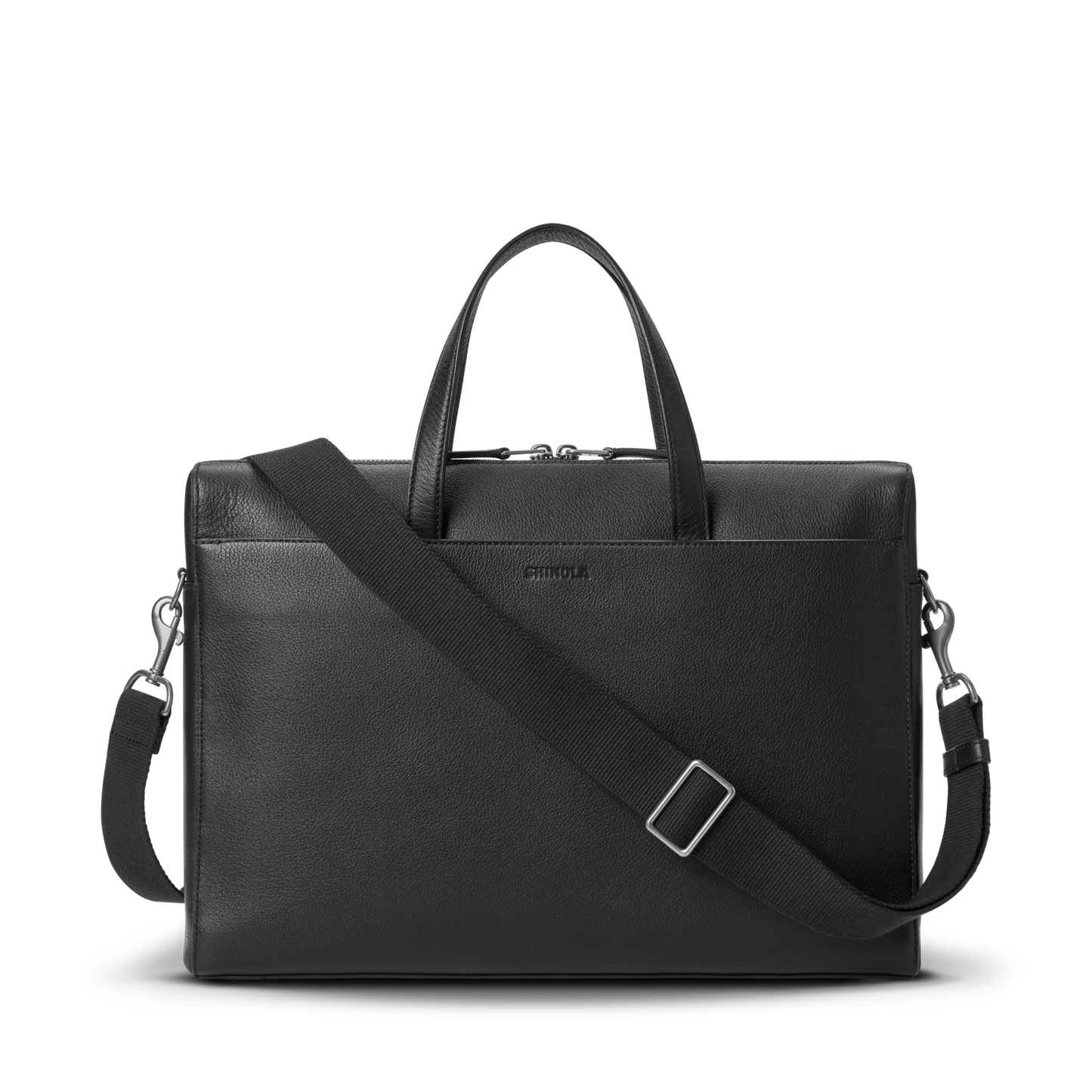 The Shinola Canfield Briefcase in black pebbled leather features two short handles and a detachable, adjustable shoulder strap—ideal for modern commuters, shown against a white background.