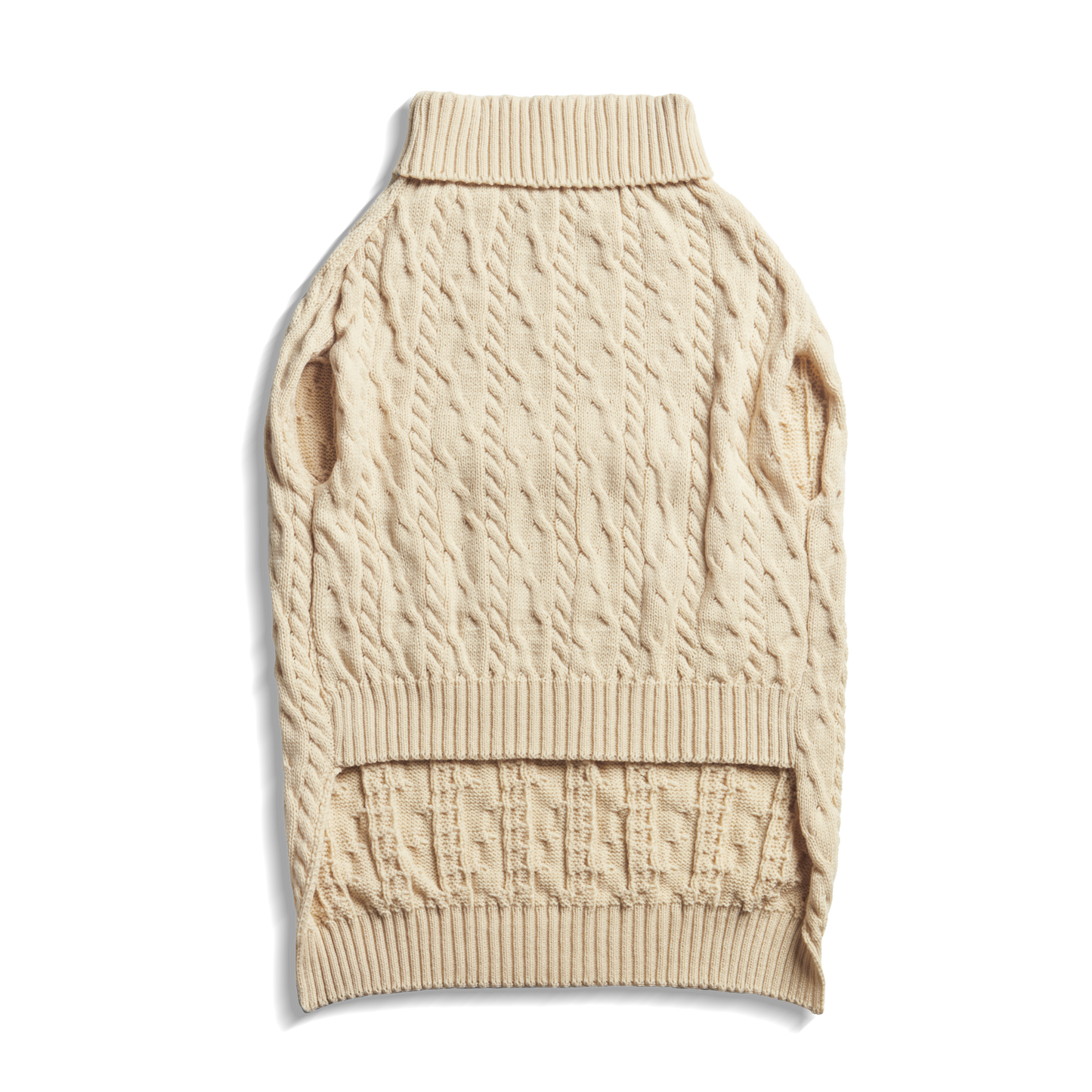 The Shinola Cable Knit Dog Sweater in Ivory features a turtleneck, leg openings, and ribbed collar and hem for added texture. Shown laid flat on a white background, this cozy pullover is perfect for your pup.