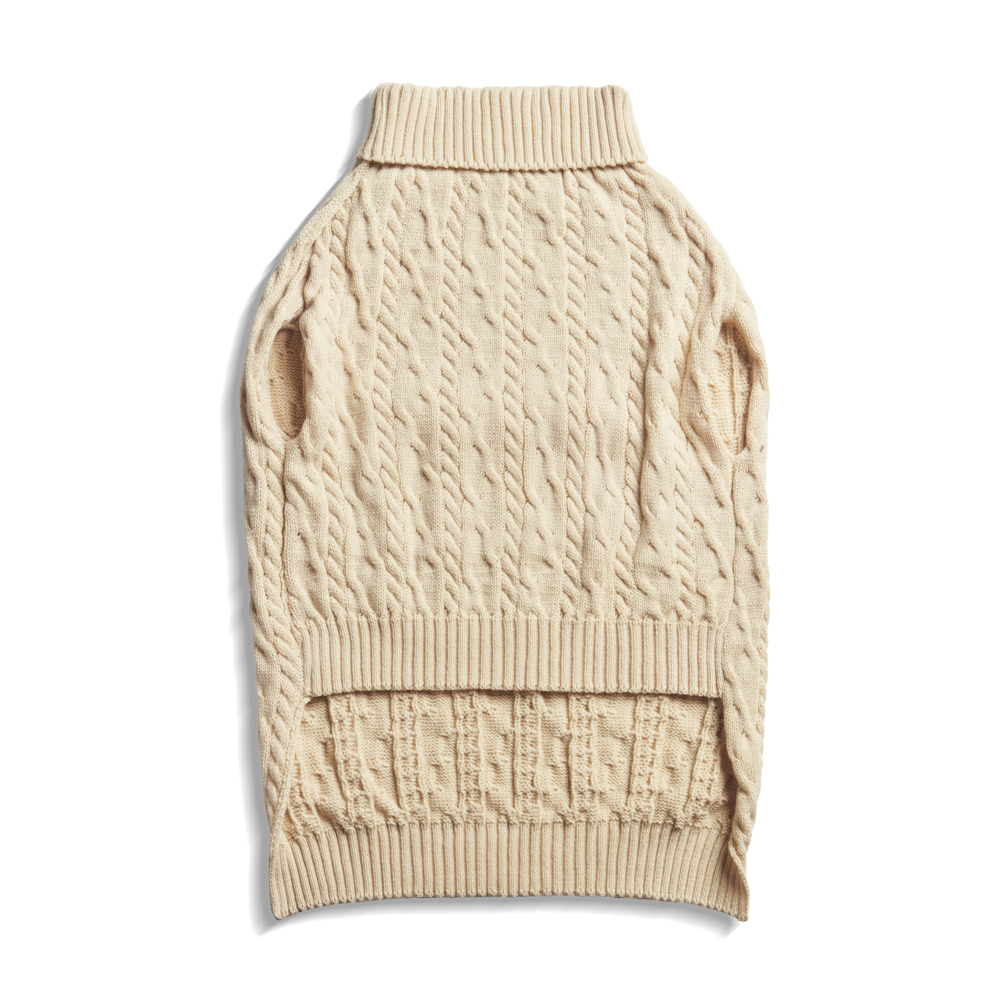 The Shinola Cable Knit Dog Sweater in Ivory features a turtleneck, leg openings, and ribbed collar and hem for added texture. Shown laid flat on a white background, this cozy pullover is perfect for your pup.