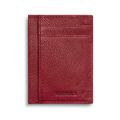 The Shinola Canfield ID Card Holder in Ruby features a burgundy pebbled leather design, two card slots, and subtle embossed branding at the bottom right, set against a plain white background.