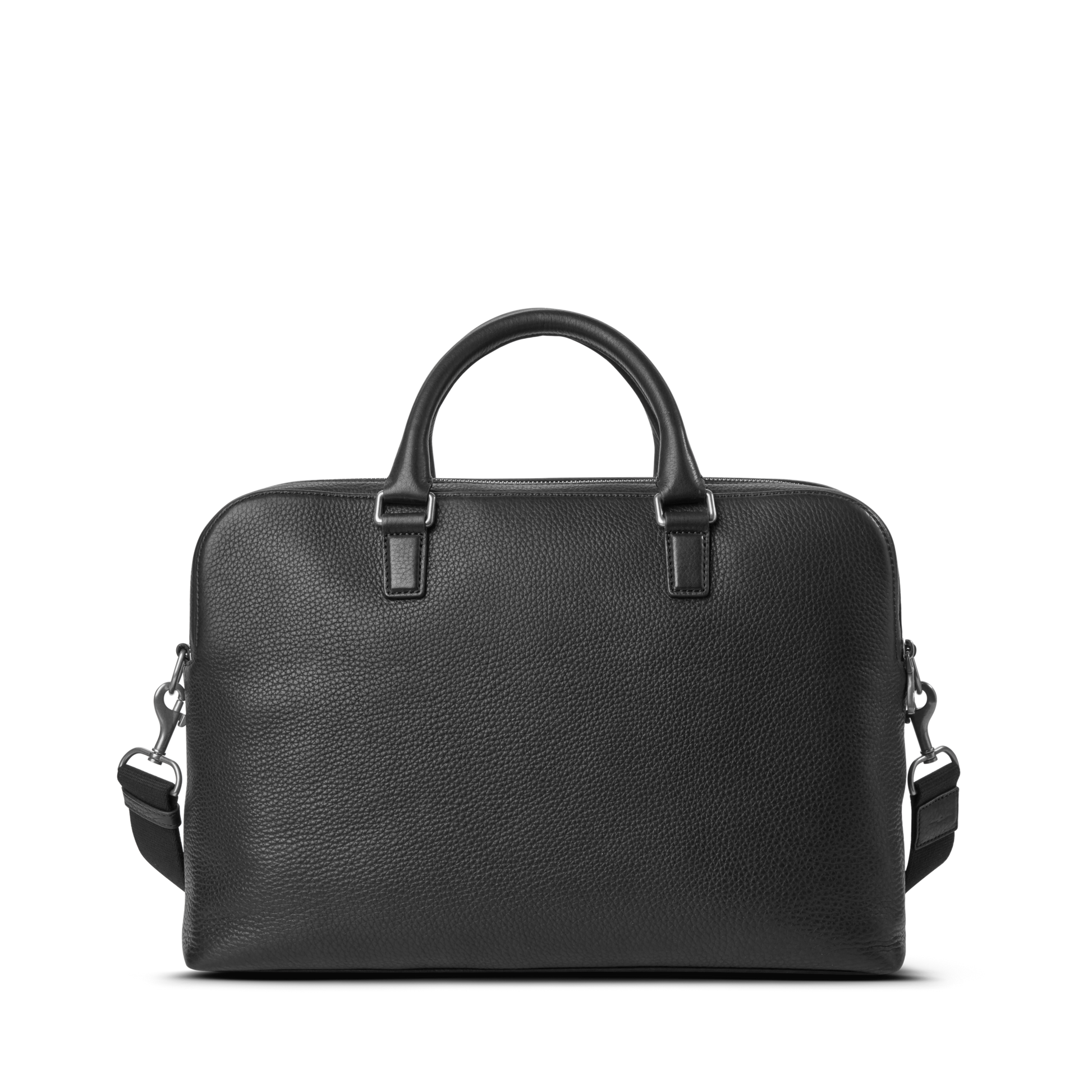 The Shinola Double Zip Briefcase - Black, crafted in natural grain leather with two top handles, an extra compartment, and a detachable shoulder strap, is shown against a plain white background.