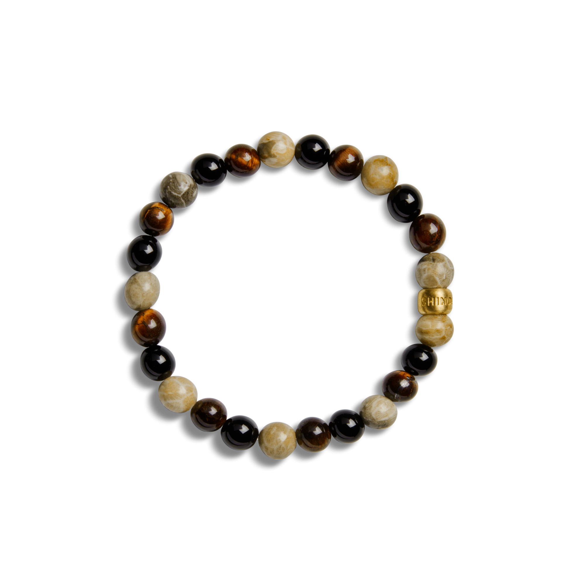 The Shinola 8mm Beaded Bracelet Multi Stone features alternating brown, black, and beige round stones with a gold cylindrical bead, all arranged in a circular pattern on a plain white background.