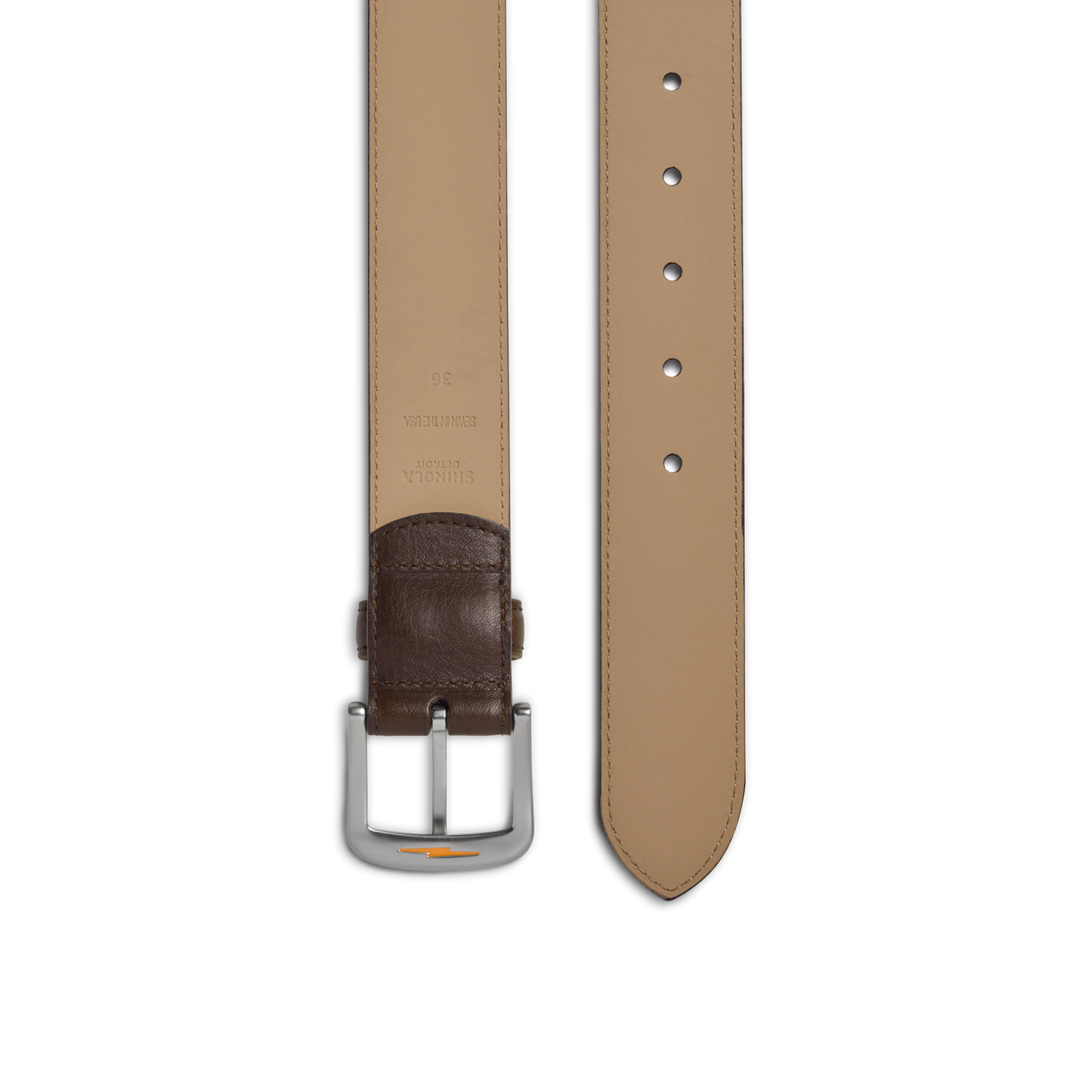 A close-up of the Shinola 1 1/2" Canfield Belt in Dark Brown, crafted from premium leather with a silver buckle and brown Italian Vachetta leather detail near the buckle, shown from both front and back.