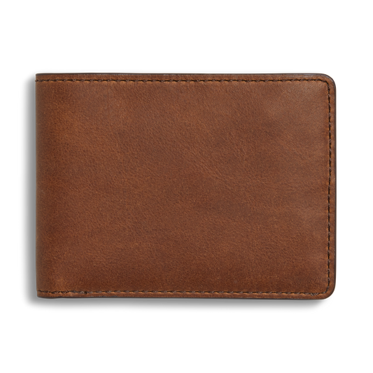 The Shinola Slim Bifold Wallet in medium brown features premium leather and visible edge stitching, shown closed against a plain white background.