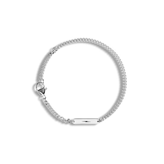 The Shinola 3mm Gauge Chain Bracelet in sterling silver features a sleek curb chain, small rectangular nameplate, and lobster clasp, shown against a plain white background.