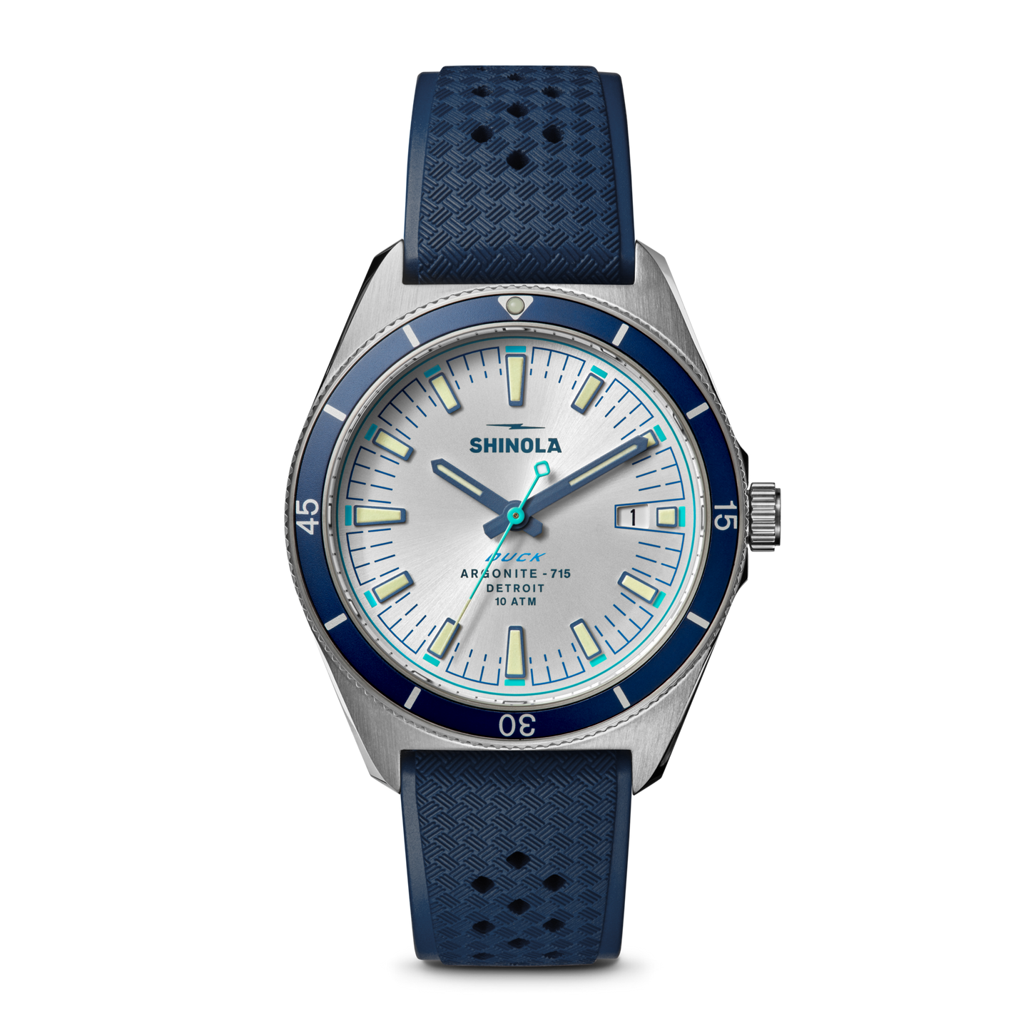 The Shinola Duck Watch - Midnight Blue features a stainless-steel case, white and blue dial, blue bezel, dark blue textured rubber strap, silver hour markers and hands, and displays 10:08.