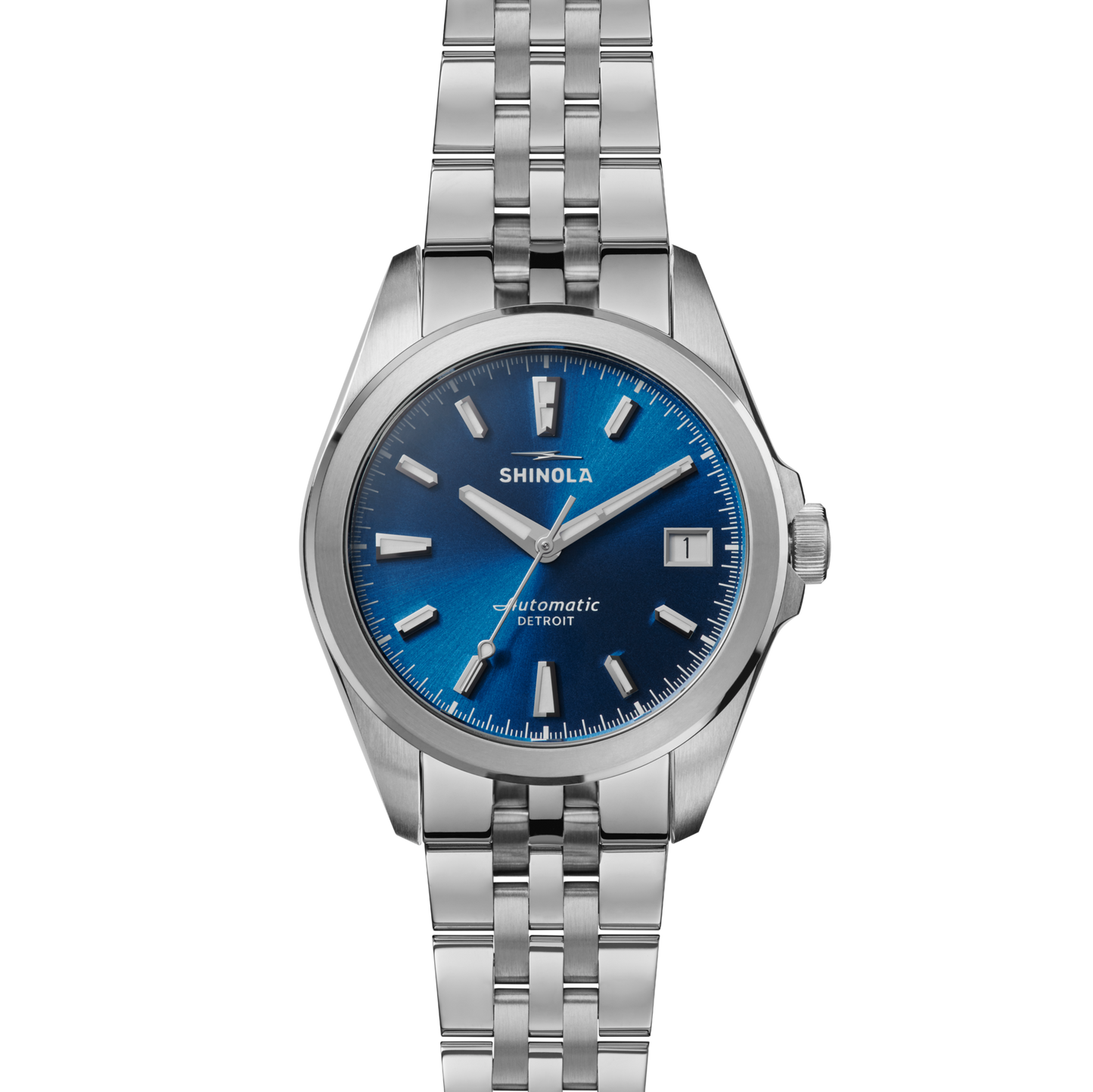 The Shinola Circadian Monster Automatic Watch - Daylight Blue features a stainless steel case, blue dial with silver markers and hands, a date window at 3 o’clock, Swiss-made movement, and "Shinola Automatic Detroit" on the face.