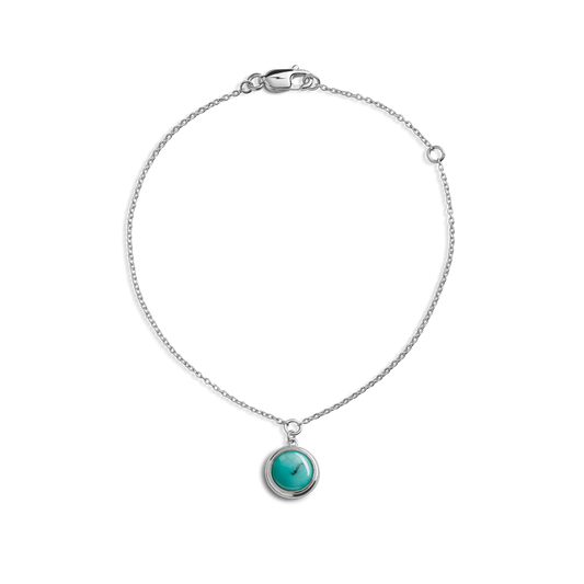 The Shinola Heirloom Turquoise Charm Bracelet features a round turquoise gemstone pendant set in sterling silver, shown on a white background.