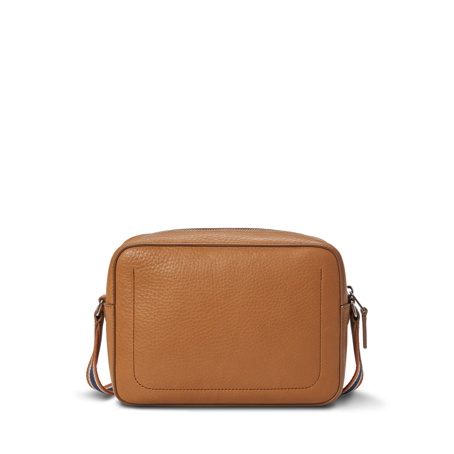 The Shinola Camera Crossbody Bag - Tan is a compact, square leather bag with a front pocket, zipper closure, and an adjustable strap with subtle colorful stripes. Perfectly sized for a 35mm camera. Shown on a plain white background.