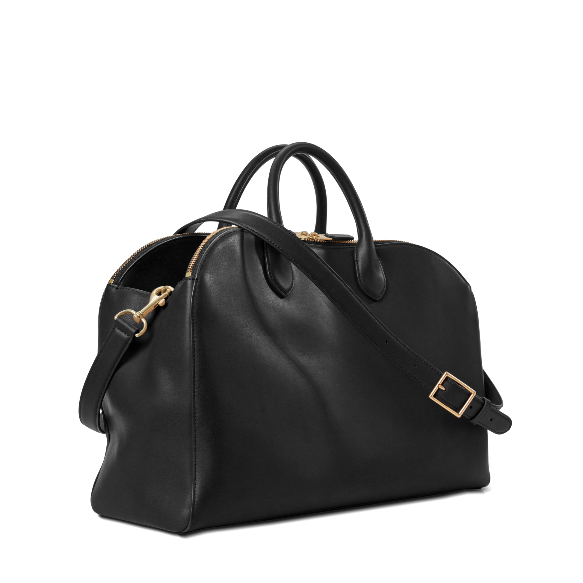 The Shinola Bixby Work Satchel - Black is crafted from natural leather with gold hardware, two top handles, and a detachable shoulder strap—ideal as a stylish laptop bag, shown against a plain white background.