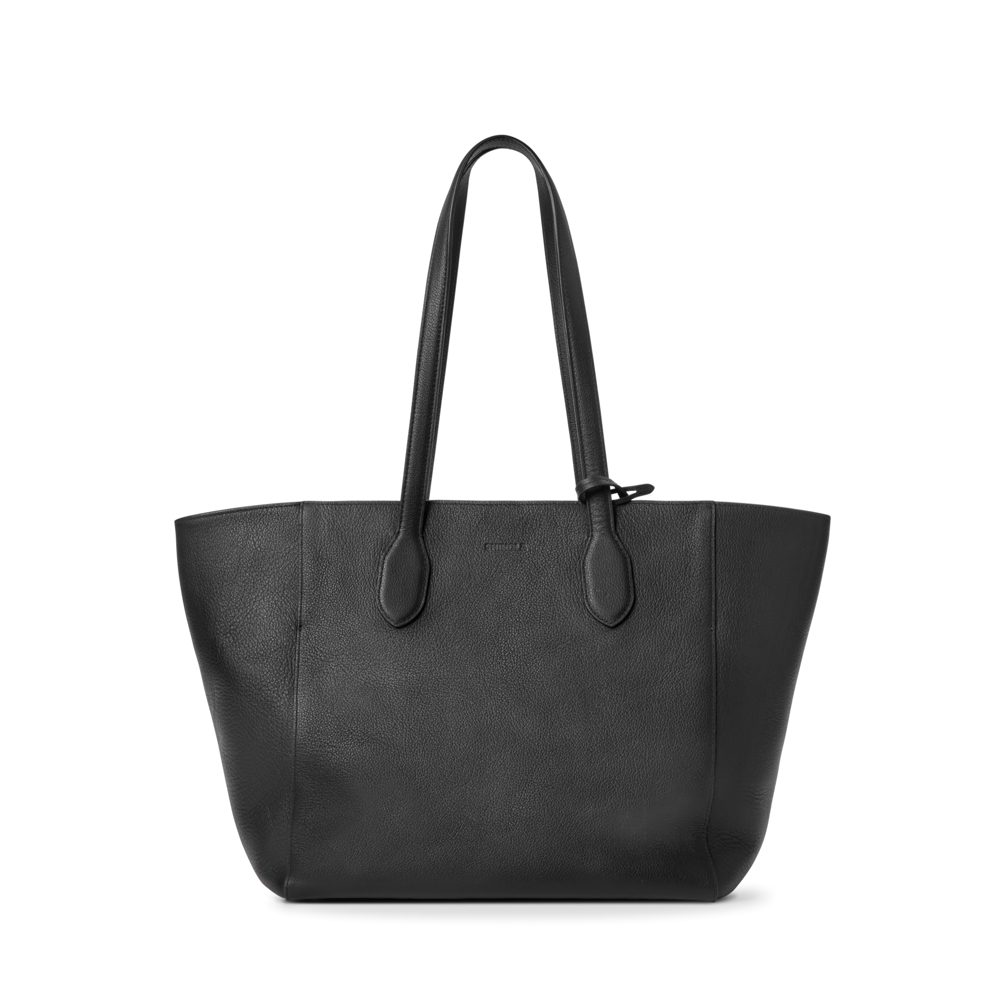 The Shinola Runabout Tote Bag - Black is a pebbled leather tote with two long shoulder straps, a minimalist design, and a matching zipper pouch, shown against a plain white background.