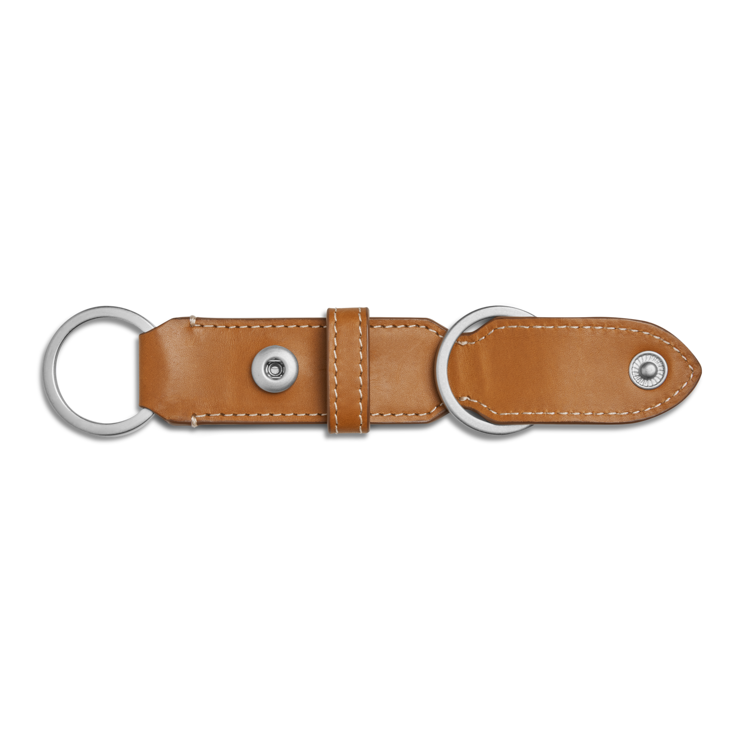 The Shinola Leather Valet Key Fob in tan features white stitching, two silver rings, and two snap buttons, shown on a white background.