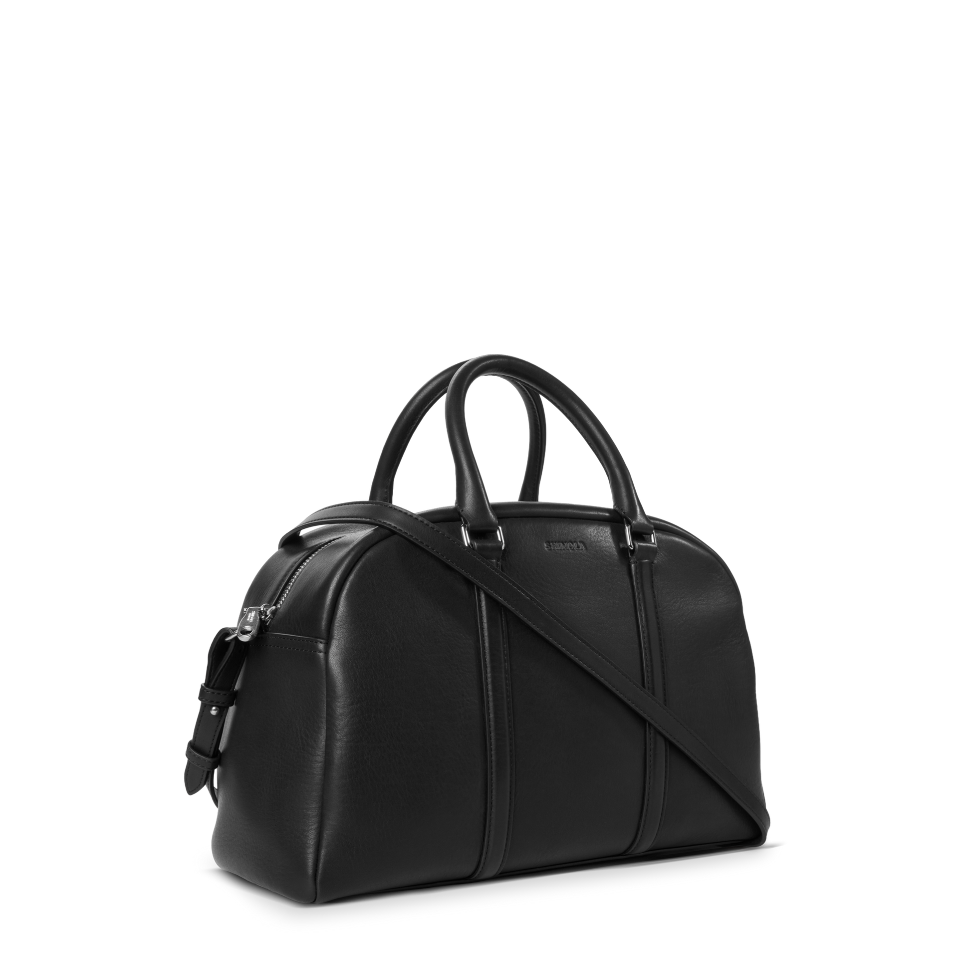 The Shinola Runwell Satchel - Black is a leather duffel bag with two handles and a detachable shoulder strap, shown angled on a plain white background.