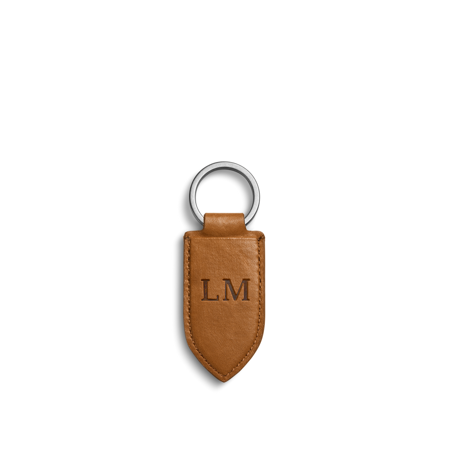 The Shinola Leather Monogram Key Fob - Tan is a personalized leather keychain with a silver ring and embossed initials "LM," shown on a plain white background.