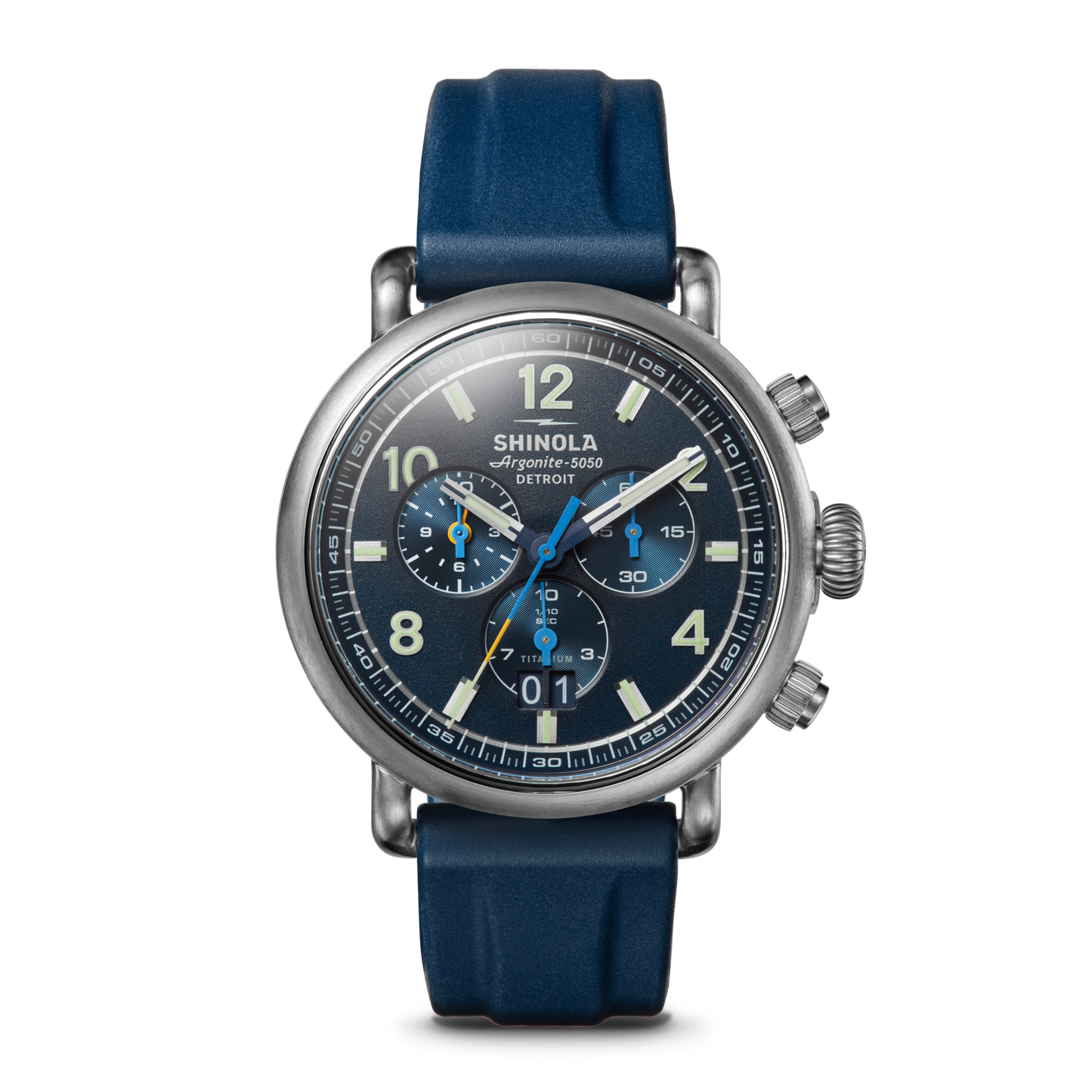 The Shinola Runwell Chronograph West Wind Watch Gift Set features a 42mm stainless steel case, blue dial with luminous hands and markers, three subdials, and a blue rubber strap.