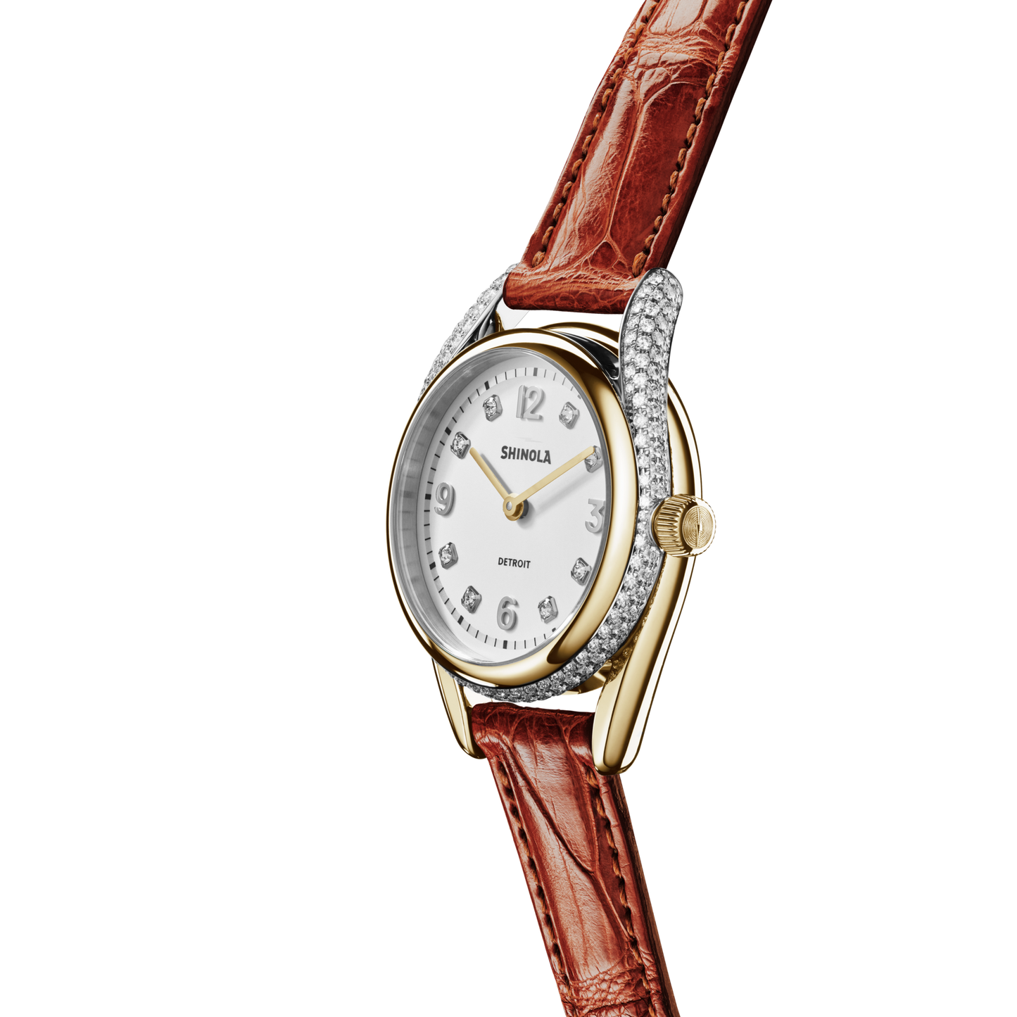 The Shinola Diamond Derby Watch features a white diamond index dial, gold hands, numeric markers, two-tone case, and an Auburn alligator strap. Pictured against a white background.