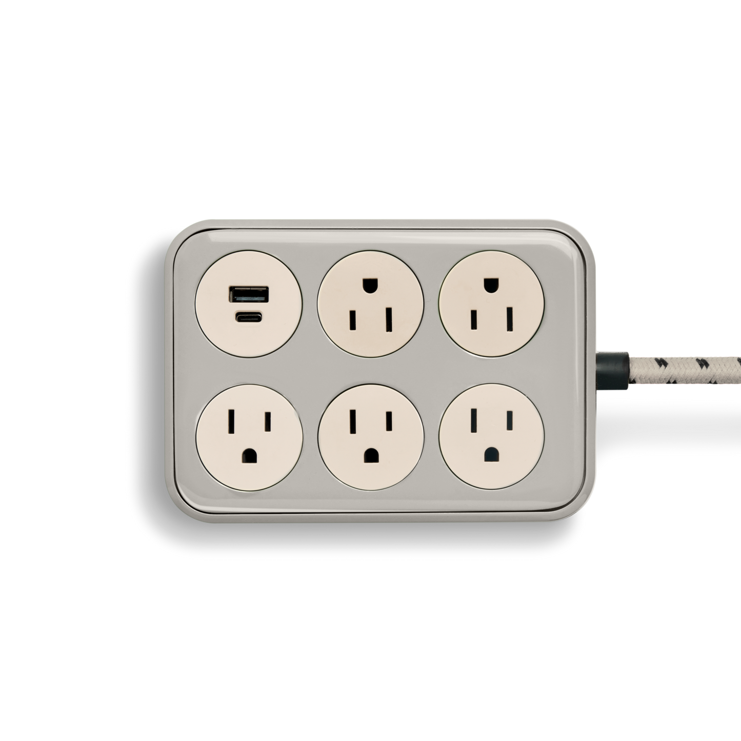 The Shinola 5 Port Power Supply - Stone features five standard outlets and one USB port, a braided cord, and is shown against a plain white background.