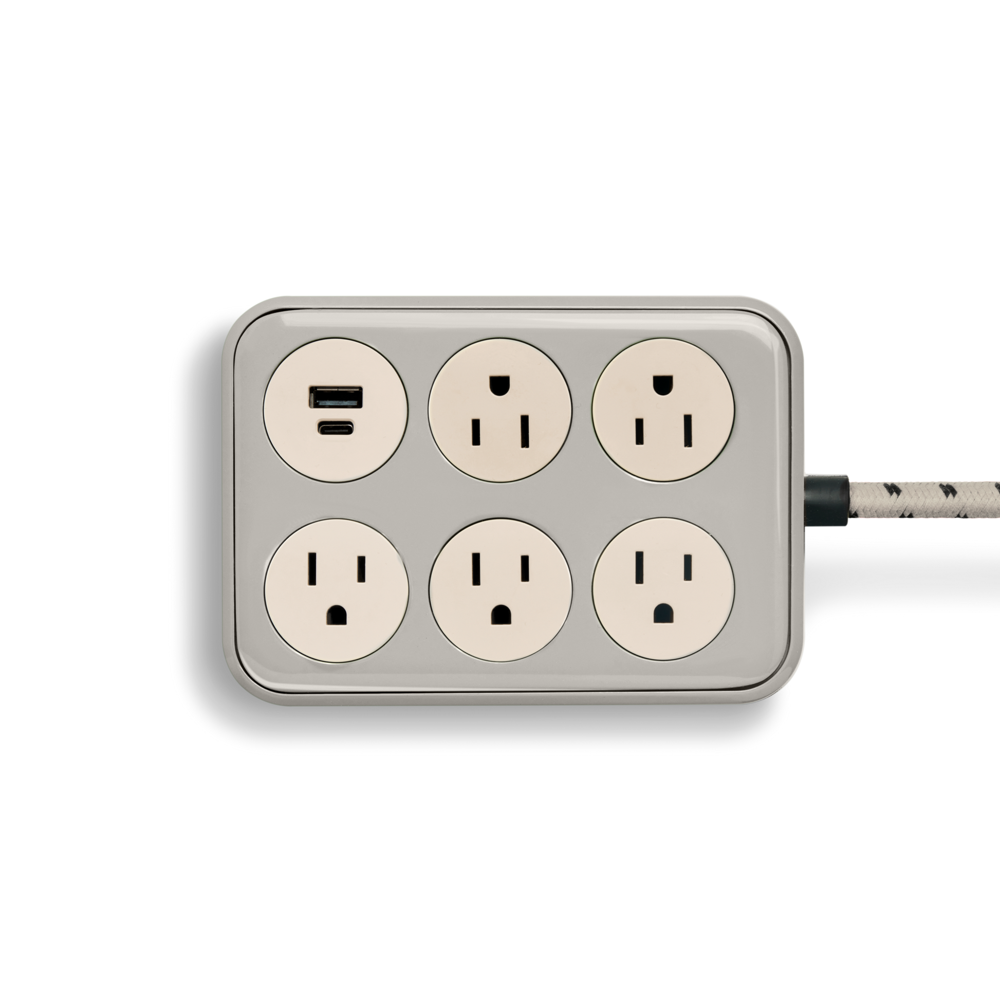 The Shinola 5 Port Power Supply - Stone features five standard outlets and one USB port, a braided cord, and is shown against a plain white background.