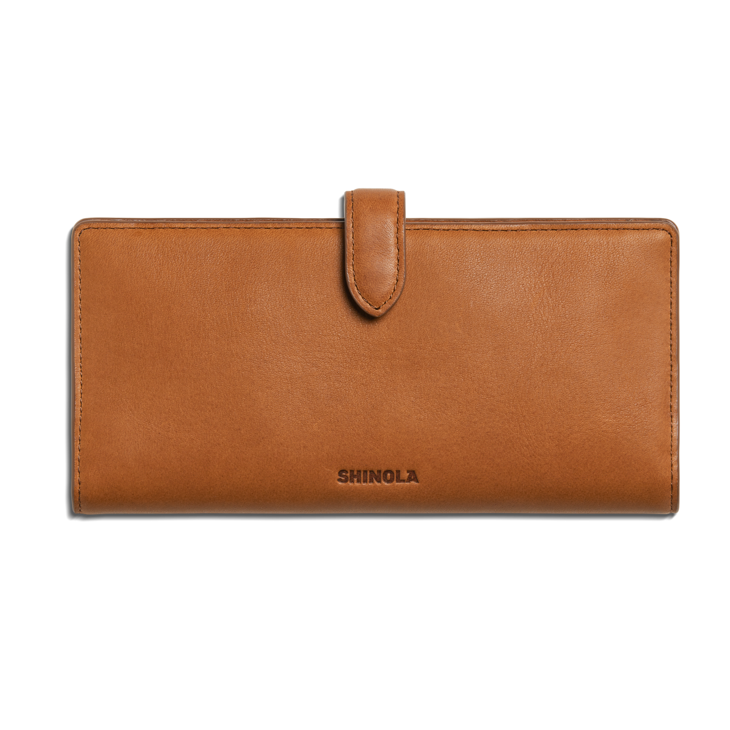 The Shinola Continental Snap Wallet - Tan is made from natural leather, featuring a slim design, flap with snap closure, and Shinola embossed on the front center. Shown against a plain white background.