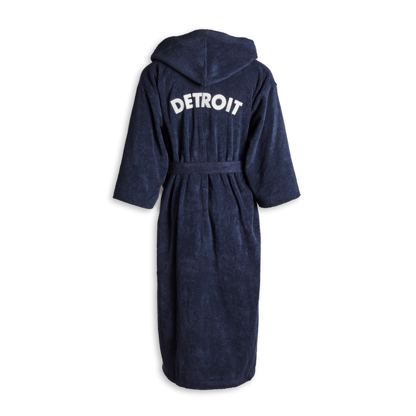 The Shinola Hotel Detroit Robe - Navy by Shinola is an ultra-plush cotton bathrobe with a belt, shown from the back, featuring "DETROIT" in bold white letters across the upper back.