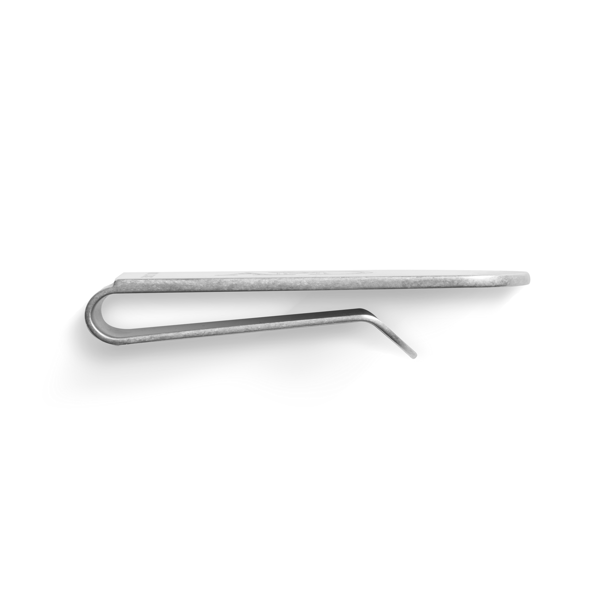 The Shinola Engravable Money Clip in sterling silver features a smooth, flat top with a curved bottom, displayed against a white background.