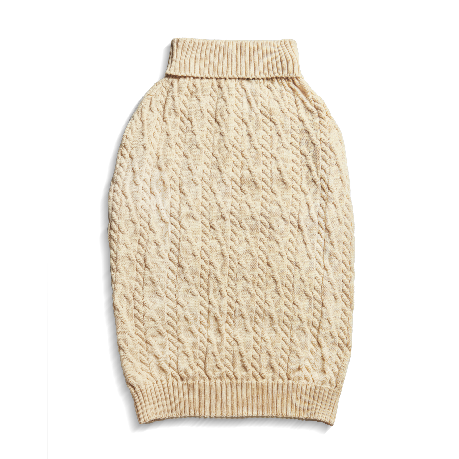 The Shinola Cable Knit Dog Sweater in Ivory features ribbed edges and a sleeveless design, shown laid flat on a white background.
