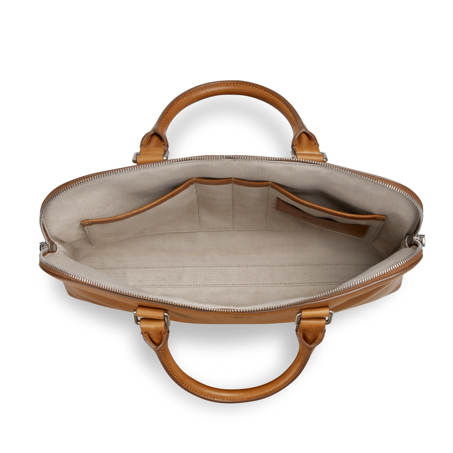 Top view of Shinola’s Portfolio Briefcase - Tan: an open pebbled leather bag with a beige fabric interior, multiple small pockets, double handles, and sleek silver zipper hardware.