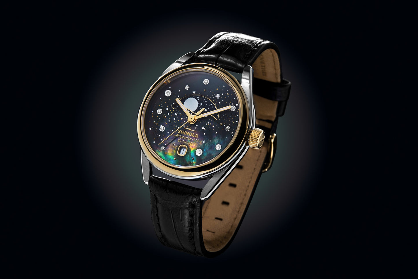 The Shinola Celestial Derby Watch - Black Mother of Pearl Diamond features a black leather strap, gold-rimmed face, diamond-like markers, moon phase window, and black Mother of Pearl dial against a dark gradient backdrop.