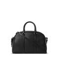 The Shinola Runwell Satchel - Black is a leather shoulder bag with two top handles, a detachable strap, minimal stitching, and a small embossed logo on the front, shown against a plain white background.