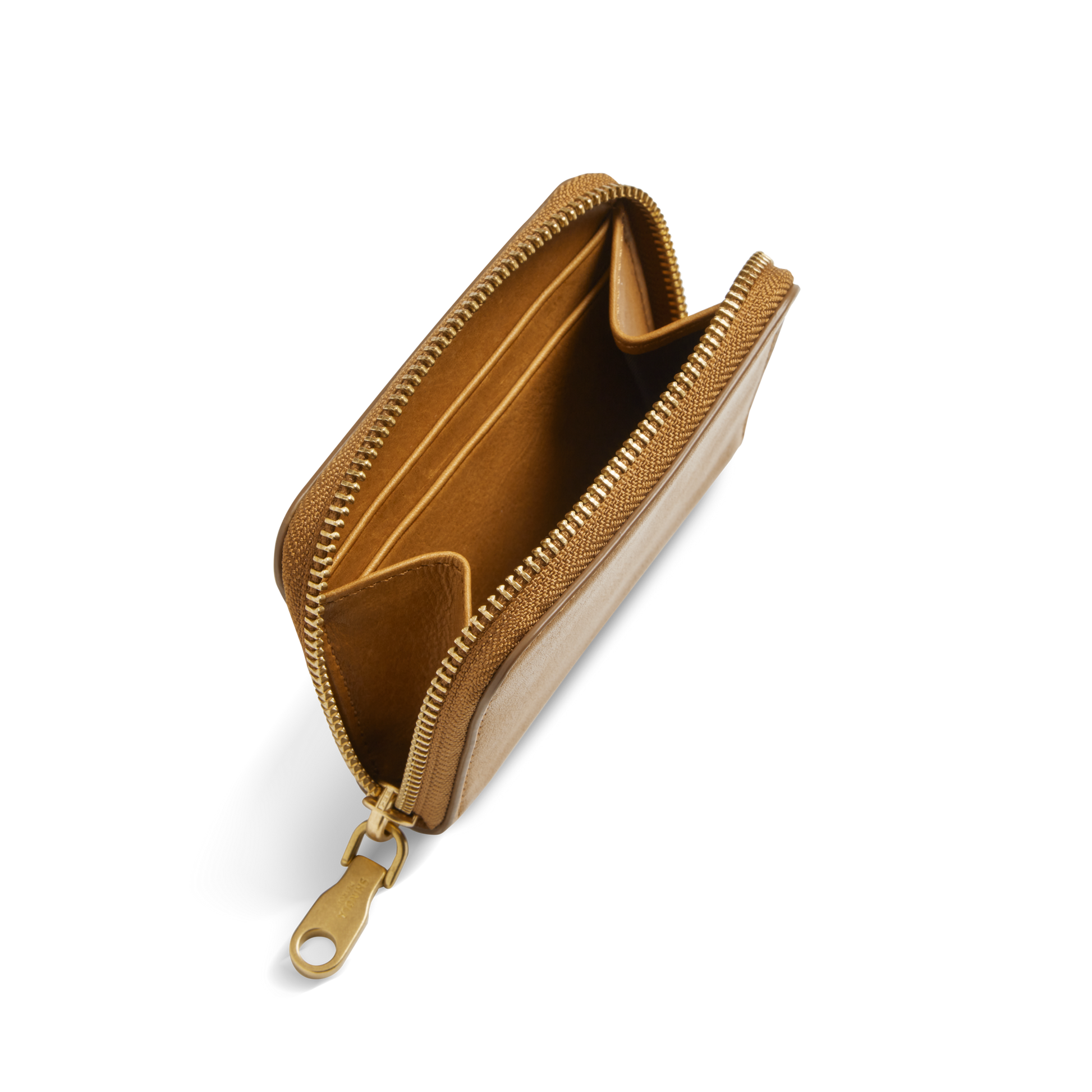 The Shinola Pocket Small Zip Around Wallet in tan natural leather features a gold zipper pull, interior card slots, and a center compartment. Shown open against a white background.