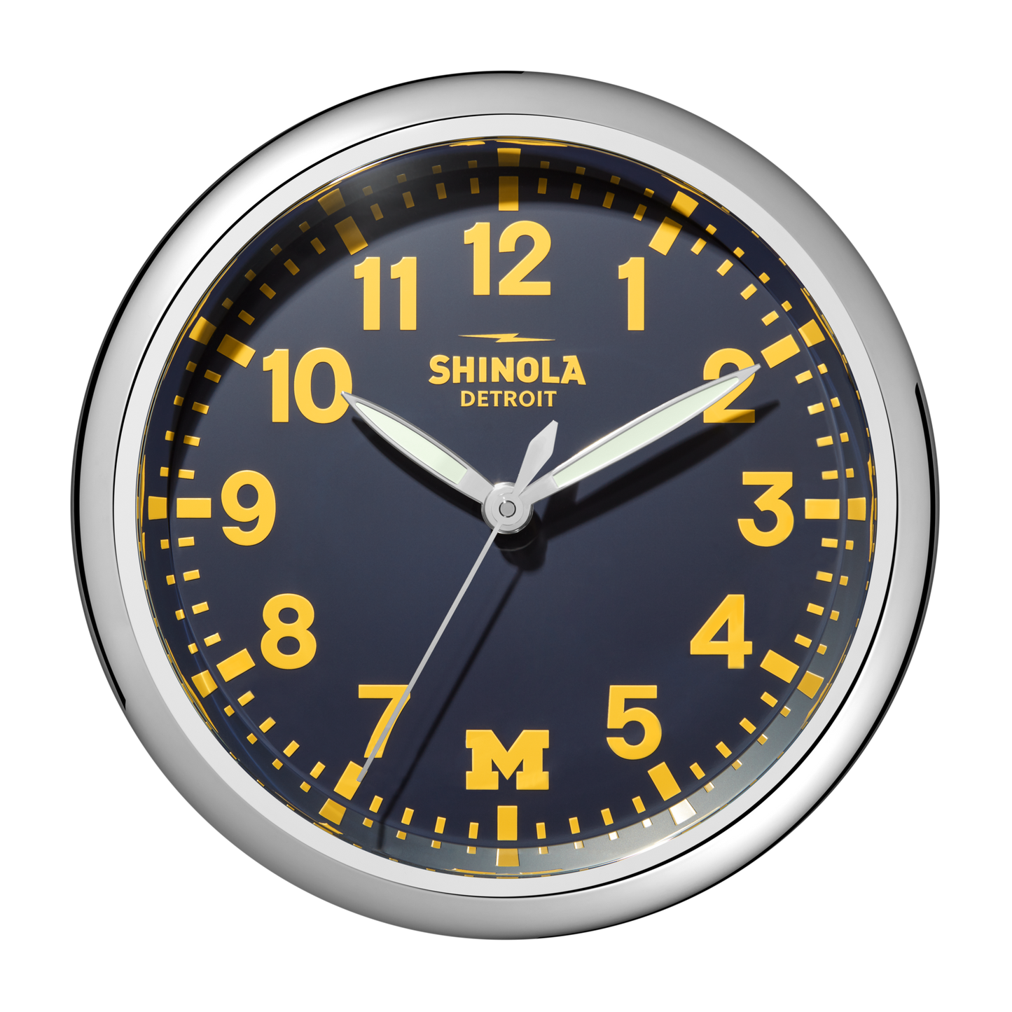 A 14" Shinola Runwell Clock with a silver frame, blue face, yellow numbers and hands. The clock reads 1:09:35, shows Shinola Detroit at the top, and has a yellow M for the University of Michigan at the bottom.