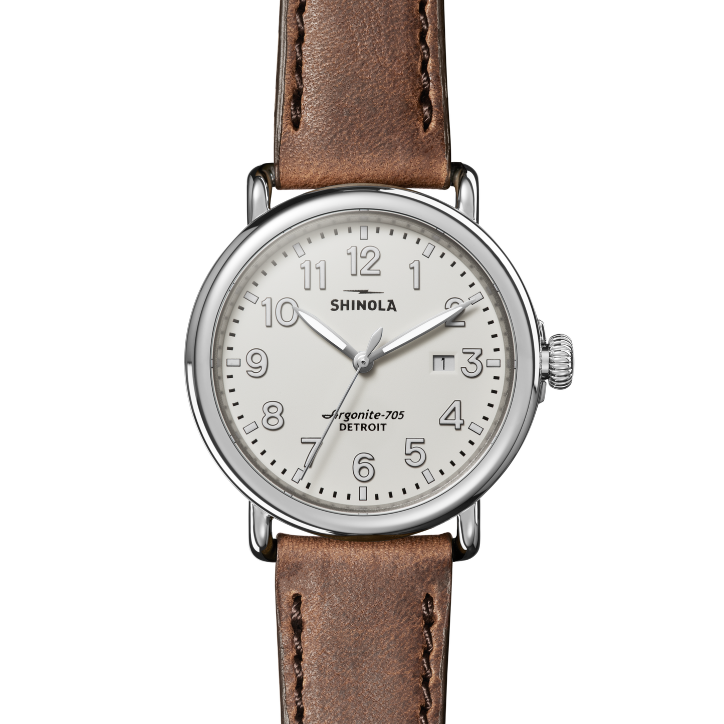 The Shinola Runwell Watch - Ivory features a round silver case, ivory dial with Arabic numerals, date window at 3 o’clock, and a brown leather strap. The watch face displays the time as 10:08:36.