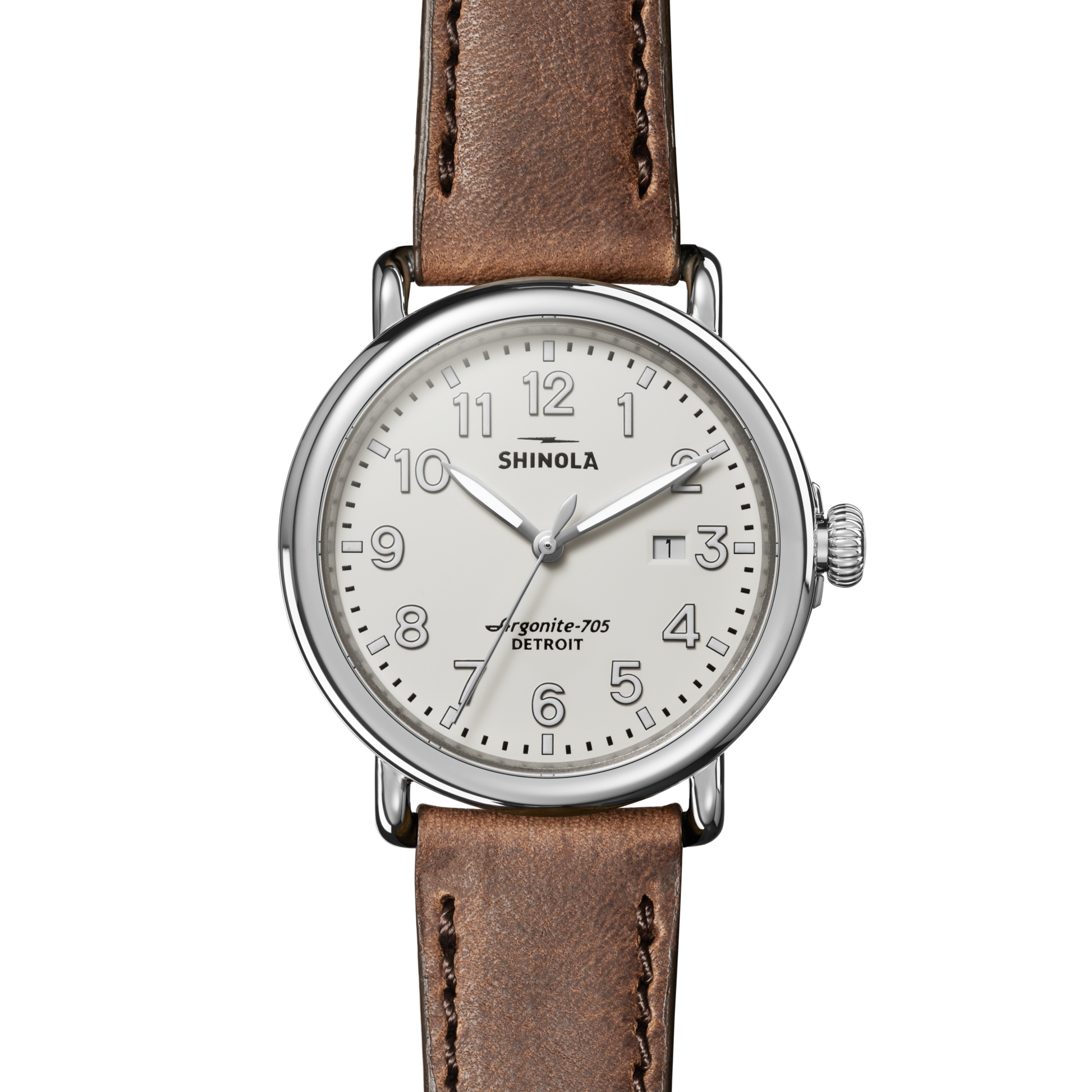 The Shinola Runwell Watch - Ivory features a round silver case, ivory dial with Arabic numerals, date window at 3 o’clock, and a brown leather strap. The watch face displays the time as 10:08:36.