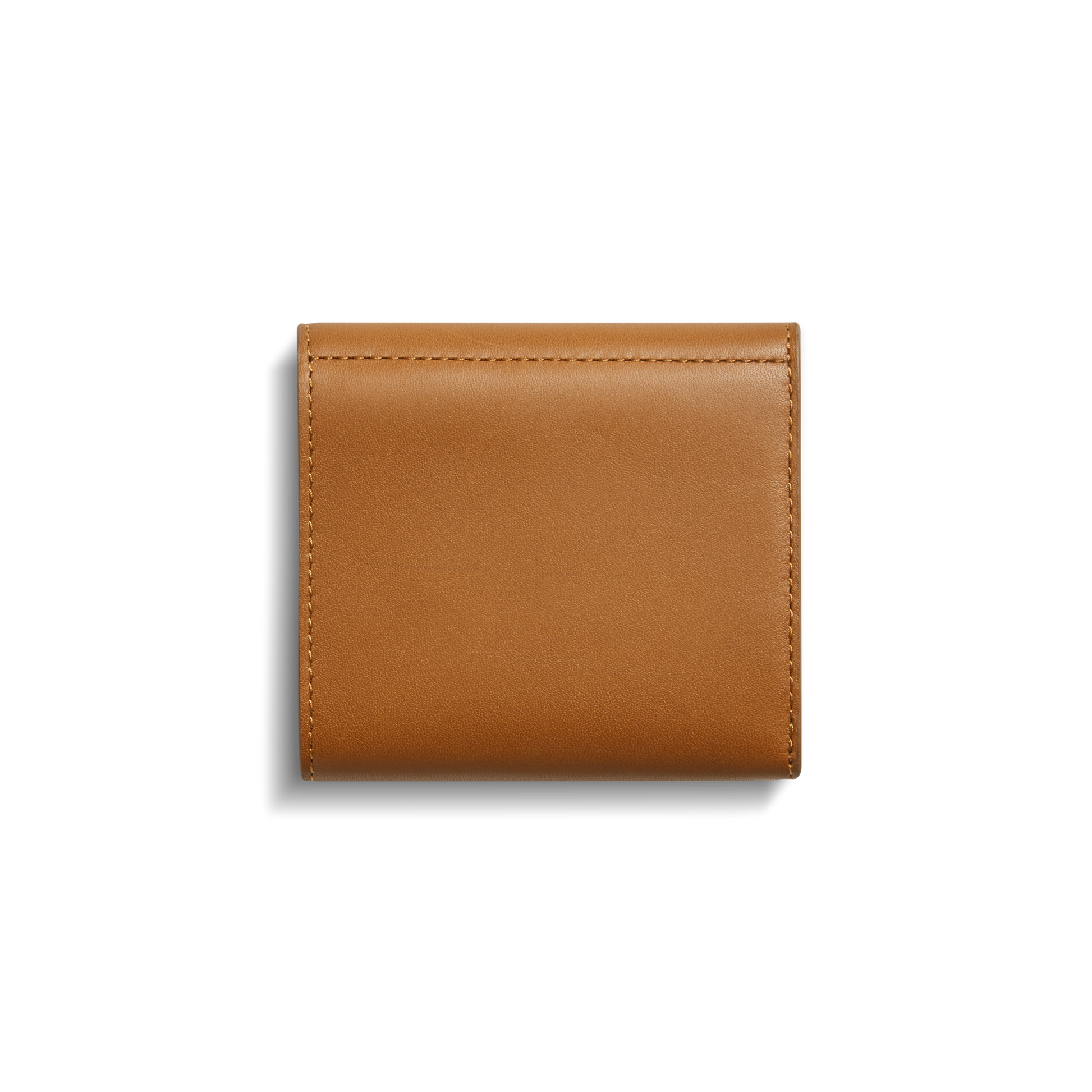 The Shinola Birdy Small Snap Wallet in tan features visible stitching, card pockets, and a closed leather design, photographed against a white background.