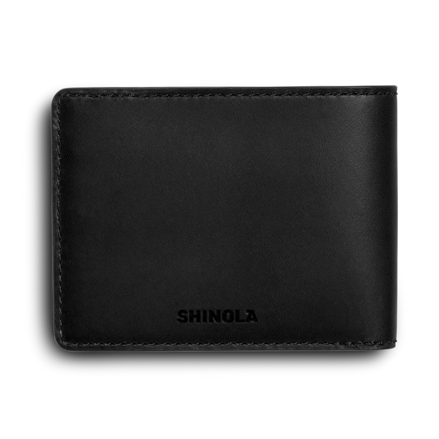 The Slim Bifold Wallet - Black by Shinola is a sleek black leather wallet with RFID protection, featuring a subtle "Shinola" emboss near the bottom and displayed on a plain white background.