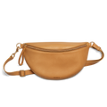The Shinola Sling Bag - Honey, featuring a tan half-moon shape, zipper closure, adjustable leather strap, and gold-tone hardware, is shown against a white background.