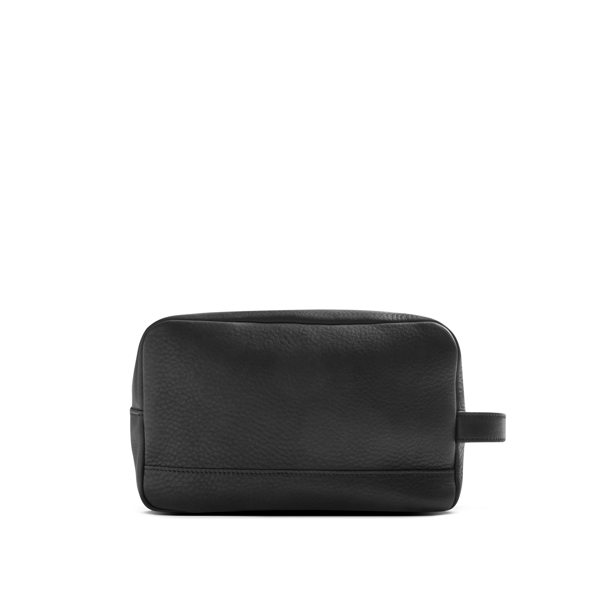 The Shinola Zip Travel Kit - Black features a rectangular design in natural grain pebbled leather with a small side handle, shown against a white background.