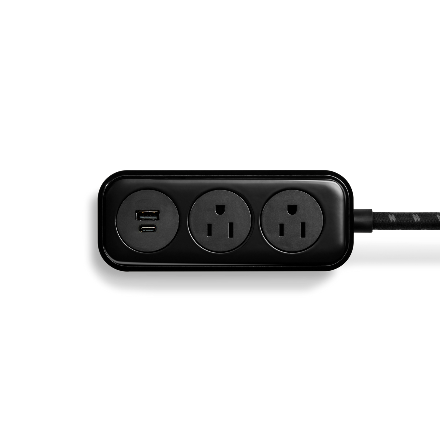 The Shinola 2 Port Power Supply - Black features two standard outlets and one USB A/C port, connected to a black and white braided extension cord, shown on a white background.