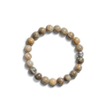 The Shinola 8mm Beaded Petoskey Bracelet features polished brown and beige Petoskey stone beads and a sterling silver “SAINT” bead—a distinctive Michigan jewelry piece.