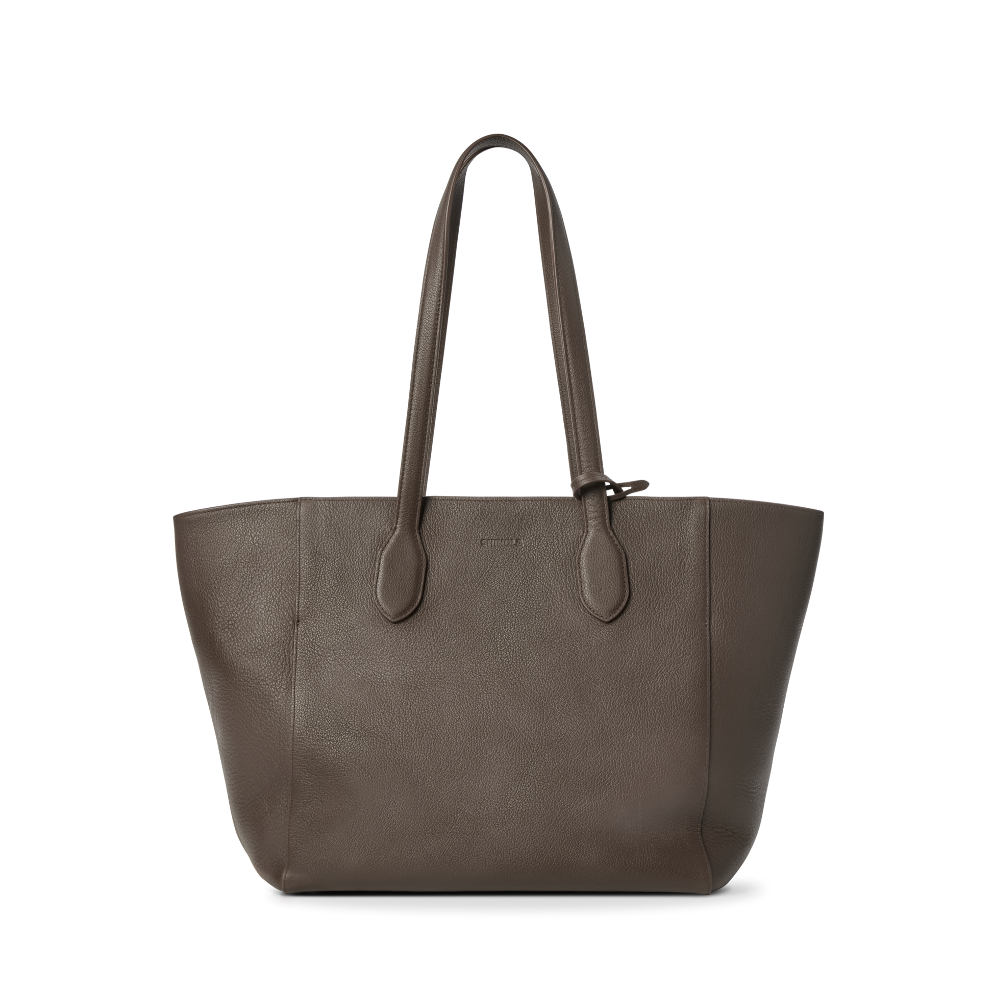 The Shinola Runabout Tote Bag - Espresso, a spacious brown pebbled leather bag with two long handles and a minimalist design, is displayed against a plain white background.