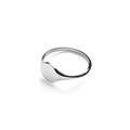 The Shinola Petite Round Signet Ring in sterling silver features a smooth, flat face and timeless minimalist style, shown against a white background.