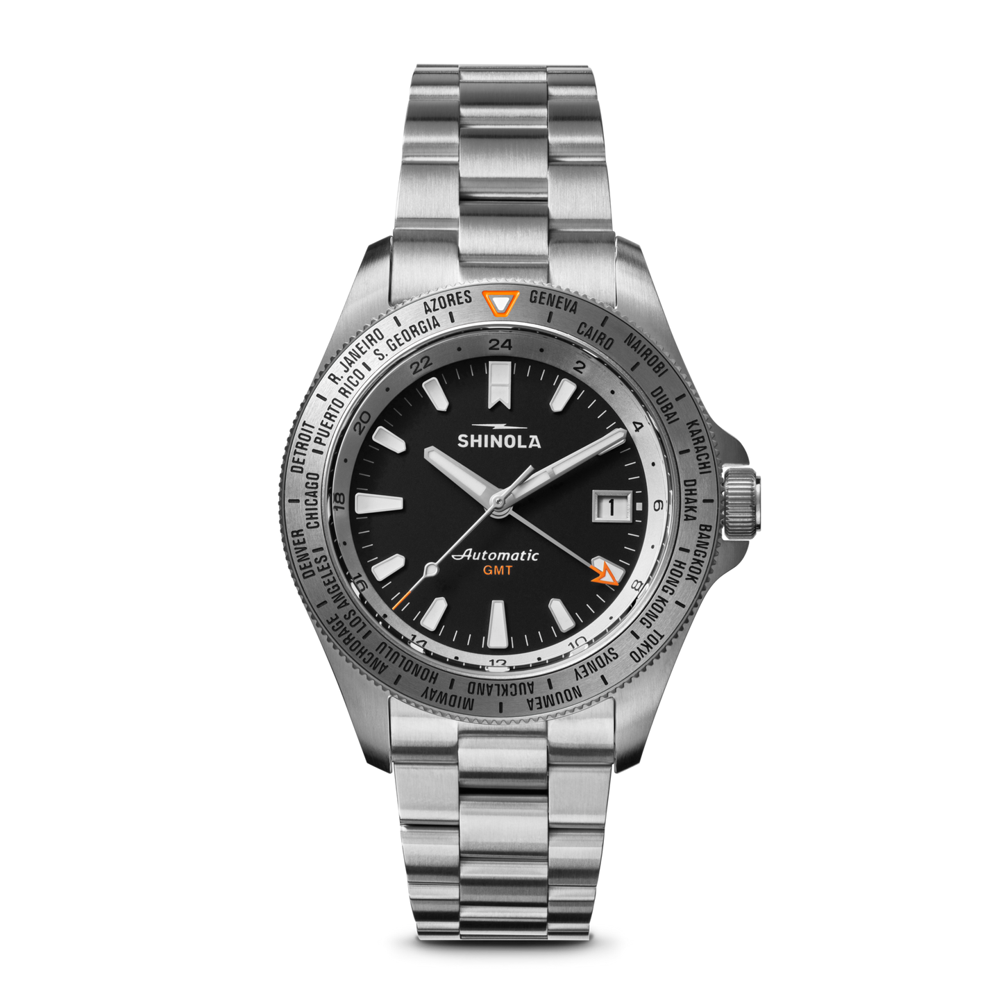 The Shinola Monster Worldtimer GMT Watch features a black dial, silver hour markers, date window at 3 o’clock, world timer bezel with cities, orange GMT hand, and a metal link band—perfect for travelers.