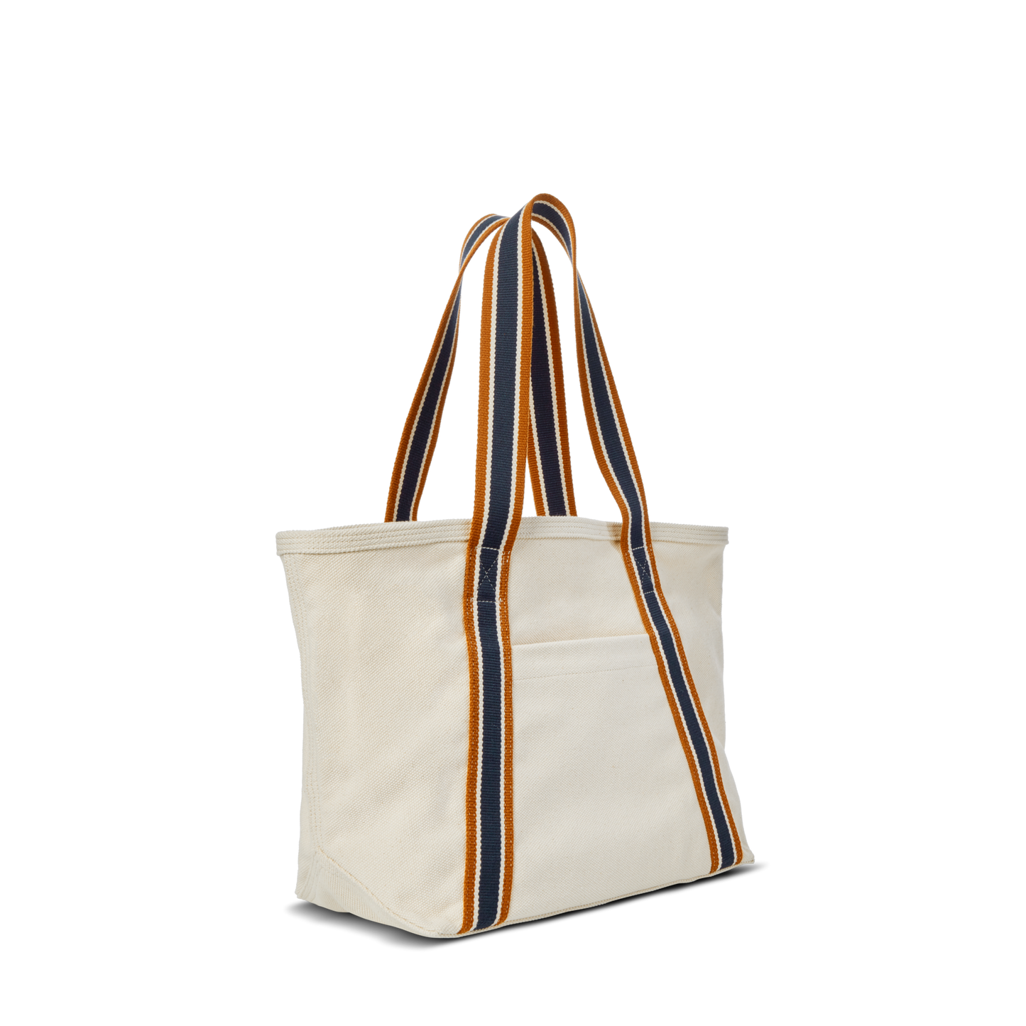 The Small Easy Canvas Tote - Natural by Shinola is a compact cream tote with wide, striped navy, gold, and orange straps plus a front pocket—perfect for everyday essentials against a crisp white canvas.
