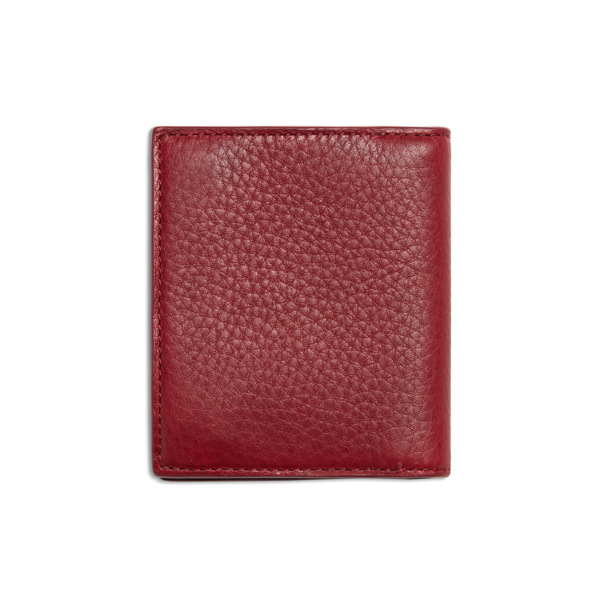 The Coin Bifold - Ruby by Shinola, a closed textured red wallet crafted from Natural Grain Leather, is centered on a plain white background.