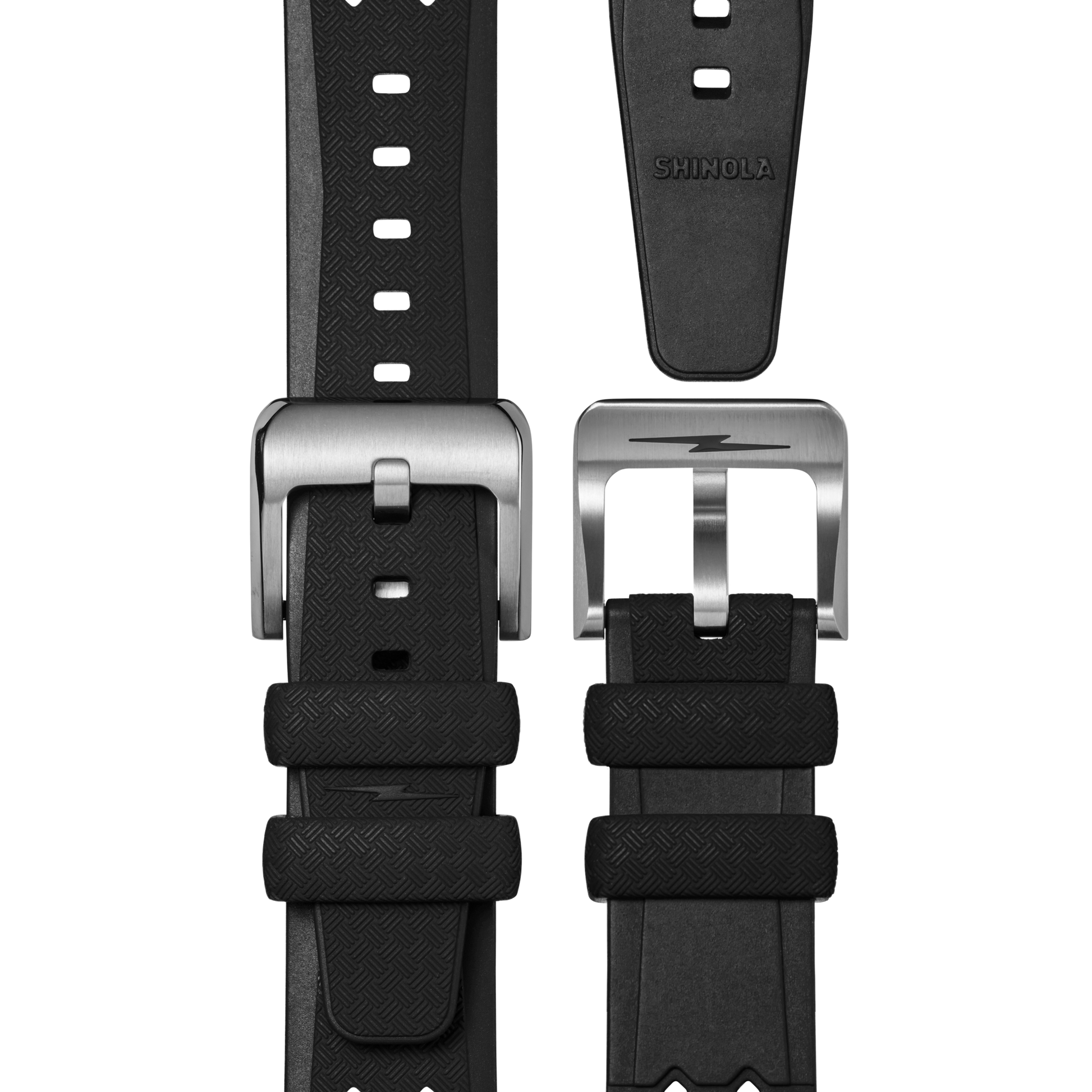 The 20mm Rubber Strap - Black Tropic Dive by Shinola features a textured black surface, stainless steel buckle, multiple adjustment holes, and SHINOLA branding on the underside. Shown in both closed and separated views.